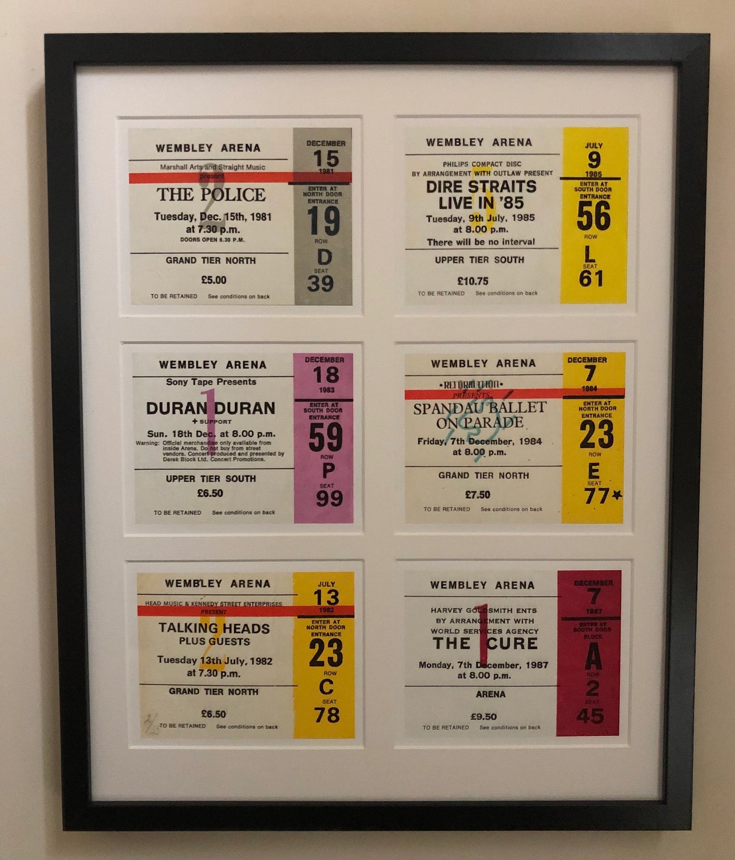 THE EIGHTIES- A framed limited edition giclee print comprising of 6 Individual Wembley concert tickets from the1980s