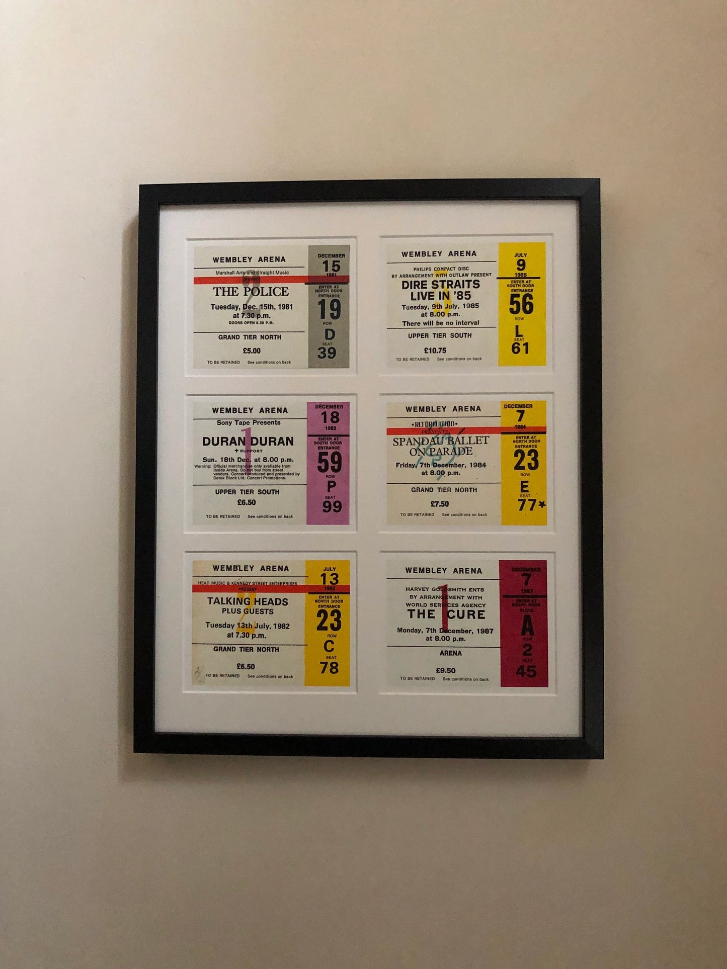 THE EIGHTIES- A framed limited edition giclee print comprising of 6 Individual Wembley concert tickets from the1980s