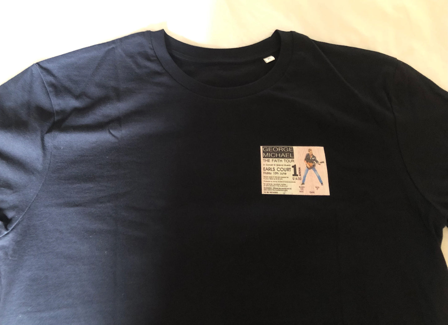 GEORGE MICHAEL - 1989 “ Faith tour “ T Shirt . Featuring the tour advert and corresponding ticket.
