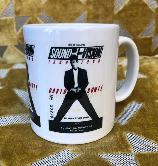 DAVID BOWIE - 11oz ceramic mug featuring the 1990 “ Sound and Vision tour”  Milton Keynes Bowl     ticket. Featuring three tickets surrounding the mug.